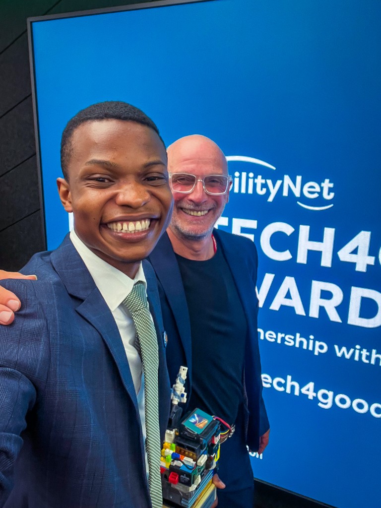 Emmanuel Umo, founder of Mau Creative Hub, at the AbilityNet Tech4Good Awards 2026 at IBM London, where Mau Creative Hub won the Young Pioneer category.