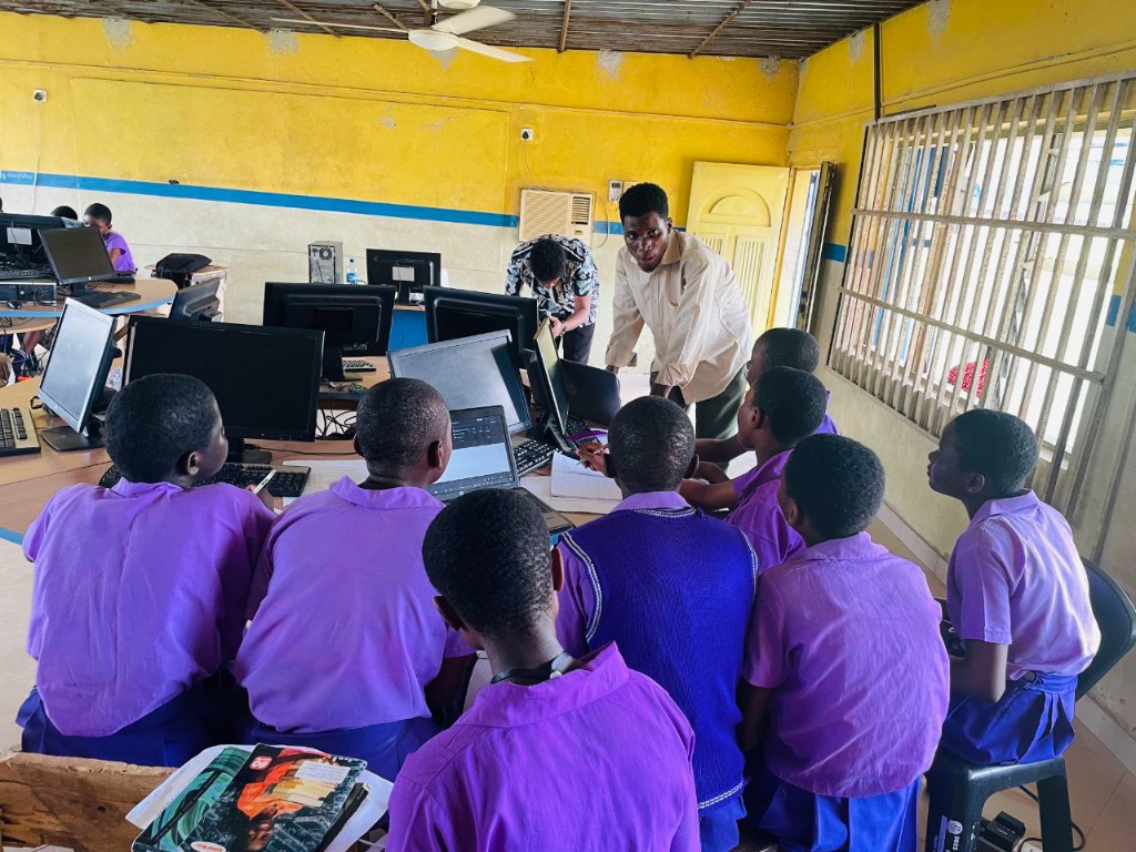 Students at Big Quo Secondary School building wireframes and clickable prototypes during ICT training